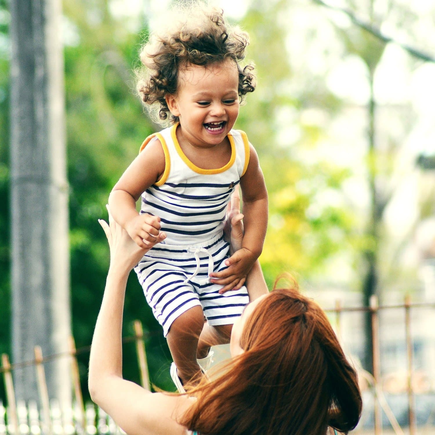 Parent holding a child